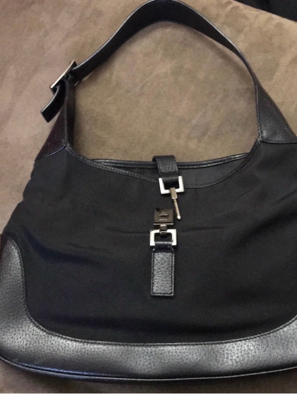 Classic Gucci Black Shoulder Bag with Buckle Accent